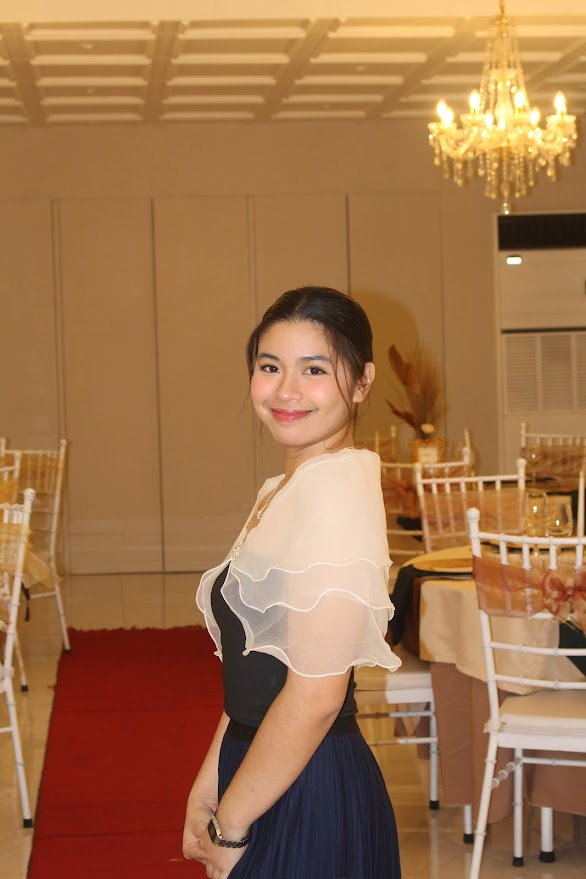 Angela smiling at an event